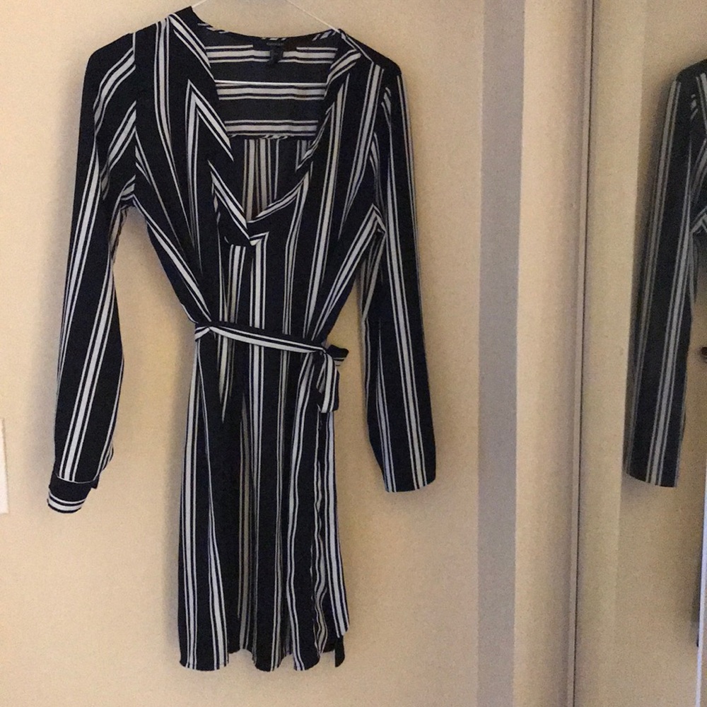 Black & white striped dress (just above the knee)